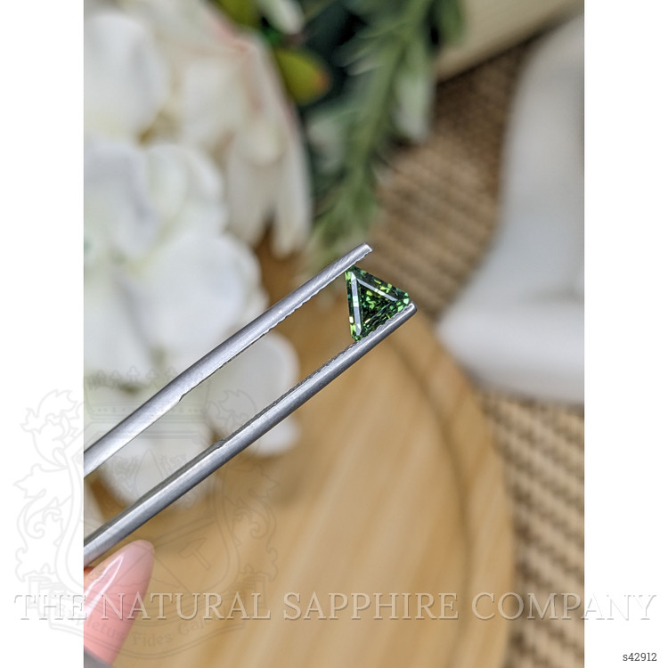 0.69 Ct. Yellowish Green Sapphire from Ceylon (Sri Lanka)