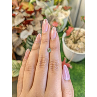 0.55 Ct. Yellowish Green Sapphire from Ceylon (Sri Lanka) Life Style