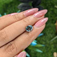 1.57 Ct. Bluish Green Sapphire from Madagascar Life Style