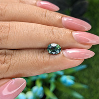 1.52 Ct. Bluish Green Sapphire from Madagascar Life Style