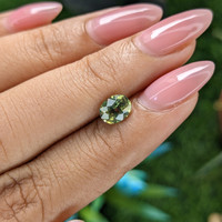 1.10 Ct. Yellowish Green Sapphire from Australia Life Style