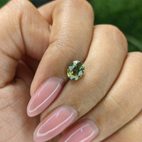 1.10 Ct. Yellowish Green Sapphire from Australia Life Style