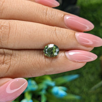 2.14 Ct. Yellowish Green Sapphire from Madagascar Life Style