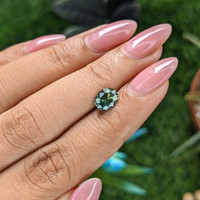 1.26 Ct. Bluish Green Sapphire from Madagascar Life Style