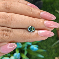 1.26 Ct. Bluish Green Sapphire from Madagascar Life Style