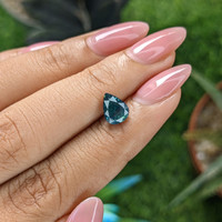 1.51 Ct. Greenish Blue Sapphire from Madagascar Life Style