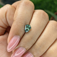 1.11 Ct. Bluish Green Sapphire from Madagascar Life Style