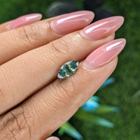 1.04 Ct. Yellowish Green Sapphire from Madagascar Life Style