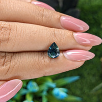 1.51 Ct. Bluish Green Sapphire from Madagascar Life Style