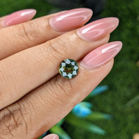 1.56 Ct. Yellowish Green Sapphire from Australia Life Style