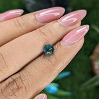 1.02 Ct. Bluish Green Sapphire from Madagascar Life Style