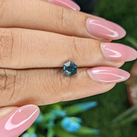 1.02 Ct. Bluish Green Sapphire from Madagascar Life Style