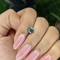 1.02 Ct. Bluish Green Sapphire from Madagascar Life Style
