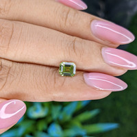 0.98 Ct. Yellowish Green Sapphire from Australia Life Style