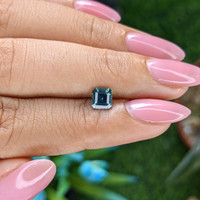 0.84 Ct. Bluish Green Sapphire from Madagascar Life Style