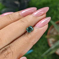 1.09 Ct. Bluish Green Sapphire from Madagascar Life Style