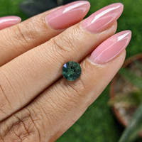1.06 Ct. Bluish Green Sapphire from Australia Life Style