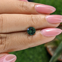 1.06 Ct. Bluish Green Sapphire from Australia Life Style