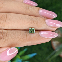 0.74 Ct. Yellowish Green Sapphire from Australia Life Style