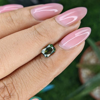 0.99 Ct. Yellowish Green Sapphire from Australia Life Style