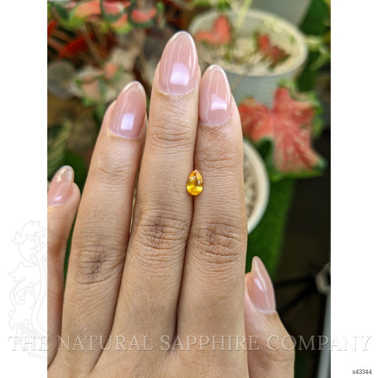 0.55 Ct. Yellowish Orange Sapphire from Ceylon (Sri Lanka)