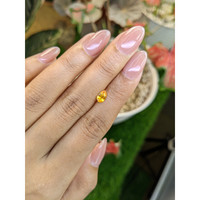 0.55 Ct. Yellowish Orange Sapphire from Ceylon (Sri Lanka) Life Style