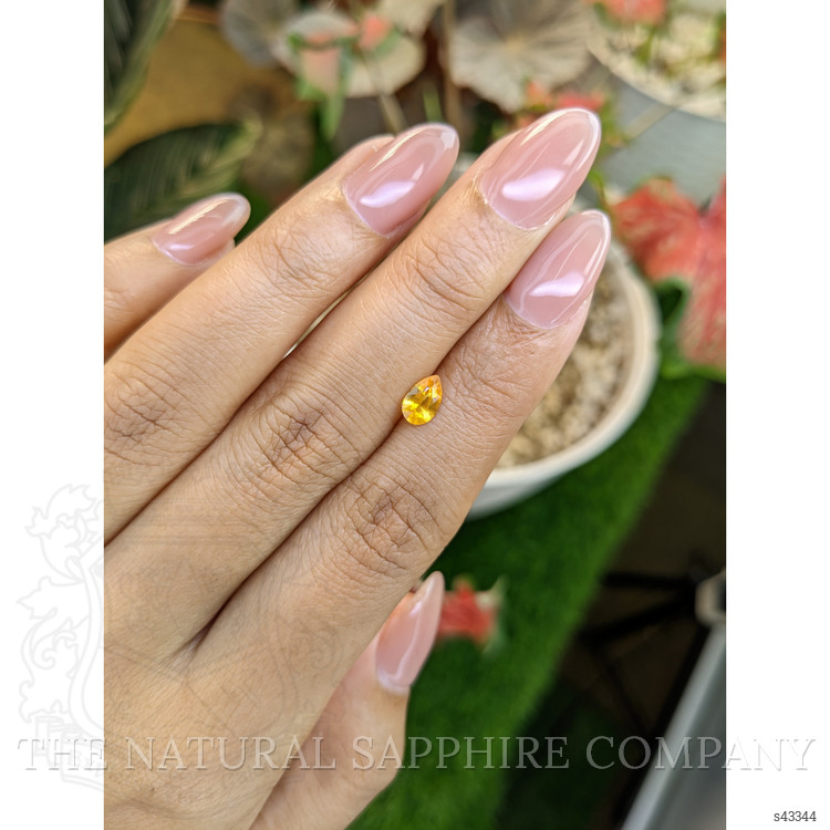 0.55 Ct. Yellowish Orange Sapphire from Ceylon (Sri Lanka)