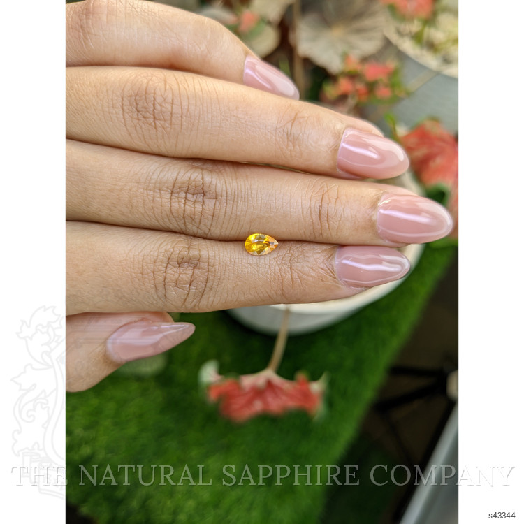 0.55 Ct. Yellowish Orange Sapphire from Ceylon (Sri Lanka)