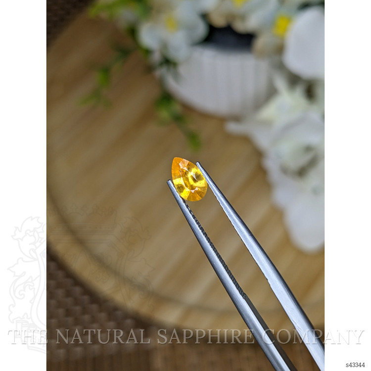 0.55 Ct. Yellowish Orange Sapphire from Ceylon (Sri Lanka)