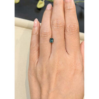 0.78 Ct. Greenish Blue Sapphire from Madagascar Life Style
