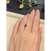 0.90 Ct. Greenish Blue Sapphire from Madagascar Life Style