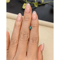 0.78 Ct. Bluish Green Sapphire from Madagascar Life Style