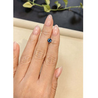 0.72 Ct. Greenish Blue Sapphire from Madagascar Life Style