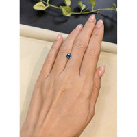 0.72 Ct. Greenish Blue Sapphire from Madagascar Life Style