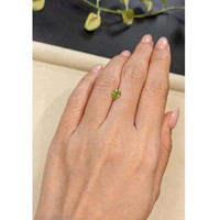 0.99 Ct. Greenish Yellow Sapphire from Madagascar Life Style