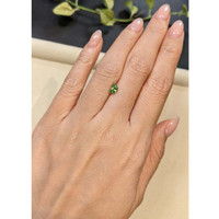 0.74 Ct. Yellowish Green Sapphire from Madagascar Life Style