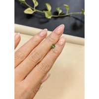 0.74 Ct. Yellowish Green Sapphire from Madagascar Life Style