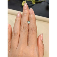 0.92 Ct. Yellowish Green Sapphire from Madagascar Life Style