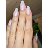 0.62 Ct. Greenish Blue Sapphire from Ceylon (Sri Lanka) Life Style