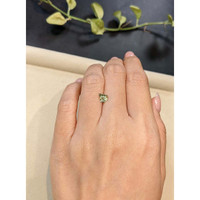 0.88 Ct. Yellowish Green Sapphire from Madagascar Life Style