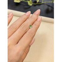 0.88 Ct. Yellowish Green Sapphire from Madagascar Life Style