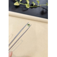 0.88 Ct. Yellowish Green Sapphire from Madagascar Life Style