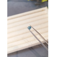0.60 Ct. Bluish Green Sapphire from Madagascar Life Style