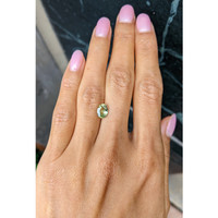 1.58 Ct. Yellowish Green Sapphire from Ceylon (Sri Lanka) Life Style