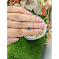 1.32 Ct. Greenish Blue Sapphire from Madagascar Life Style