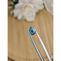 1.32 Ct. Greenish Blue Sapphire from Madagascar Life Style