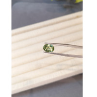 3.10 Ct. Yellowish Green Sapphire from Madagascar Life Style