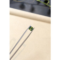 3.07 Ct. Yellowish Green Sapphire from Madagascar Life Style