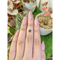 0.79 Ct. Greenish Brown Star Sapphire from Ceylon (Sri Lanka) Life Style
