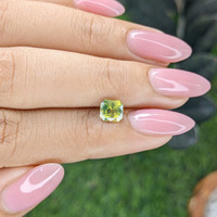 1.28 Ct. Yellowish Green Sapphire from Madagascar Life Style
